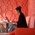 Latino woman taking an online course